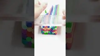 Artist is creating a vibrant colorful cane with polymer clay!