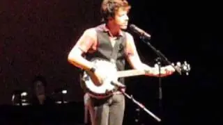John Gallagher, Jr. plays the banjo