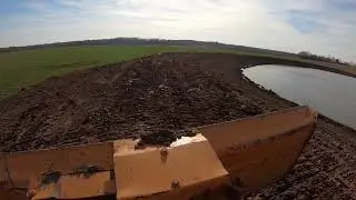 Case 850H finishes the pond dam rebuild just in time!!