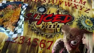 SLICED PIZZA- HORROR THEMED PIZZA SHOP IN LAS VEGAS🍕 Black crust!