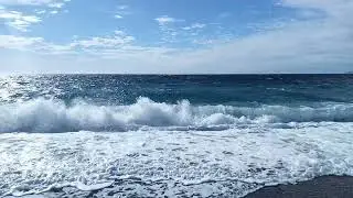 Big waves crashing at the shore in Southern Spain. Sound on.
