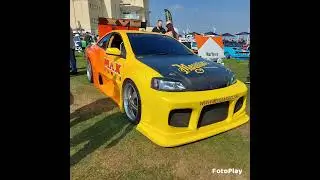 Max Power cars at a car show
