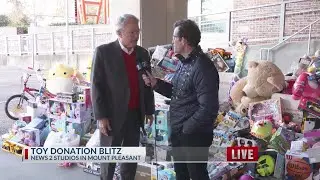 News 2 and Mayor Tecklenburg at the Toy Drive Blitz