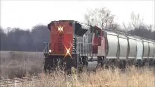 L574 WITH A SD70M2 RUNNING LONG HOOD FORWARD