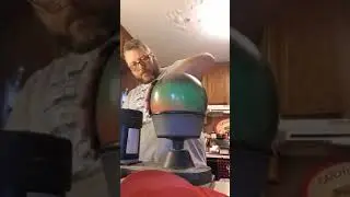 Resurfacing a bowling ball.