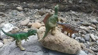 Help a lot of dinosaur toys cross the river using a truck