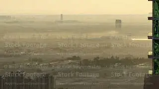 Early morning during sunrise aerial view from skyscraper with foggy weather near Dubai Marina