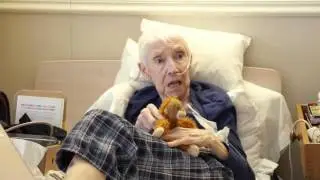 Woman in Nursing home talks about her stuffed animal