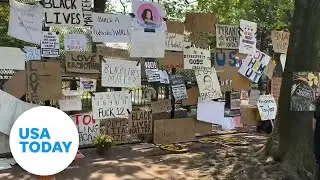 White House fence covered with 'BLM' posters | USA TODAY