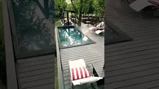 Shipping container pool overlooking a private lake 😍