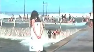 Dee Why Rock Pool kids surfing huge swell in 1970's