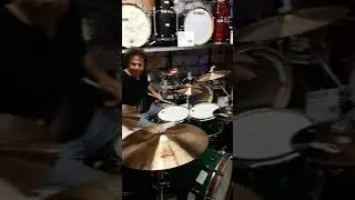 My mate Robert playing drums in guitar centre Boston Massachusetts