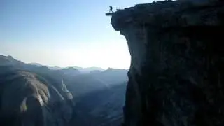 GUY BASE JUMPING OFF HALF DOME!