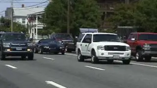 Cop stops a black camaro during cruisin weekend in Ocean City, Maryland 2010