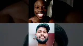 Black man laughing in the dark