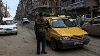 Taxi drivers dodge snipers on Syrian frontline