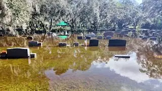 Some graves underwater at Titusville cemetery after historic flooding
