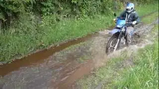 Dirt bike on dirt road up volcano. @Ba&ntilde;os, Ecuador