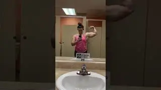 Beautiful teen girl bicep flex in gym mirror 💪