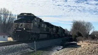 NS T53 leaving bulls gap yard leading 9866 C40-9W and 9938 trailing 