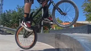 BMX ride at the skatepark. Bunny hop training, slowmo and fun 