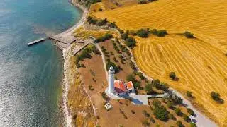 Seddulbahir, Eceabat, Turkey. Historic Mehmetcik Feneri lighthouse standing at entrance to Dardan...