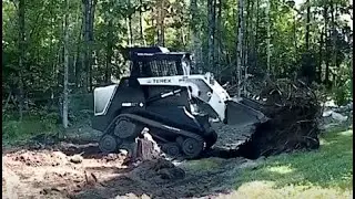 Removing Trees with Roots using a Track Loader !