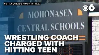 Wrestling coach accused of hitting teen