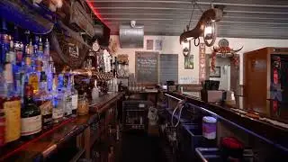 Turnkey Bar and Grill with Front Patio and Backyard Entertainment Area