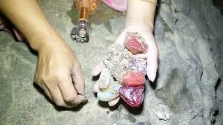 Red crystals are formed in quartz veins on the seashore. Agate, diamond, ruby, moonstone