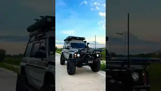 A travel vehicle that goes somewhere and sleeps in an off-road style.