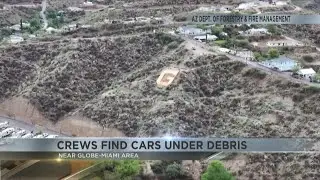 Crews discover two cars buried in Globe-Miami flood debris