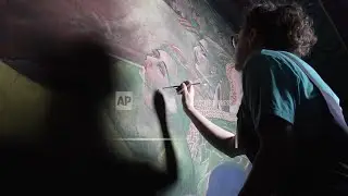 A conservation team preserves historic church murals of faith and social justice