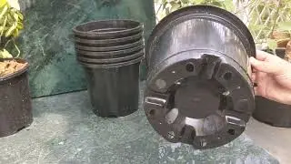 black nursery 8 inch flower pot .