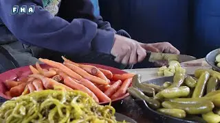 عدسة الفرات تزور أحد معامل صناعة المخلل وتجهيز مونة الزيتون في مدينة جنديرس