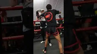 Shakir Snow Muay Thai fighter from KO Combat Academy smashing pads with Bradley Heason