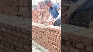 Skilled Bricklayer Building Strong Wall with Precision and Speed