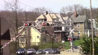 AVR locomotives head north light through Evans City, PA