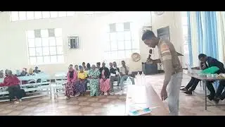 M.c Max Jay leads a funny game in a Camp