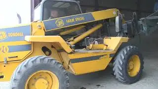 NEW HOLLAND TS115 TIPPING WHEAT AND JCB 520 AND GRAIN PUSHER