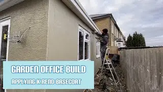 Applying K Rend base coat to the garden office