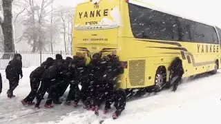 Northeastern University Woman&rsquo;s Basketball Team Pushes Bus Out of Snow