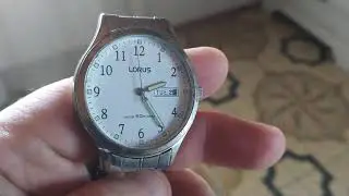 Lorus by Seiko day date model VX43-X052
