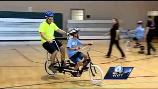 One of a kind camp offers people with special needs bike riding lessons.