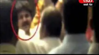Cop dances with gangsters