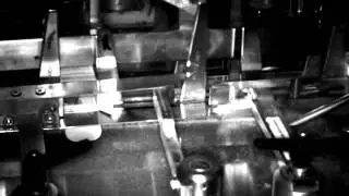 Carton lid closer - Cyclocam hi-speed camera close-up, ( slow motion video )
