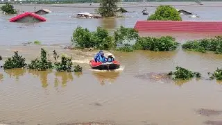Operations continue at Dongting Lake to close dike breach