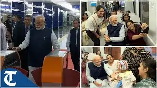 PM Modi takes metro ride; many passengers interact with him, snap selfies