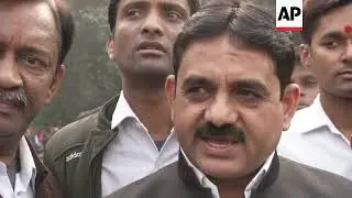 Congress party supporters celebrate early election results in India