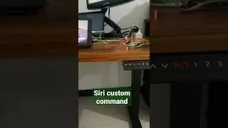 Height adjustable desk with Siri custom command